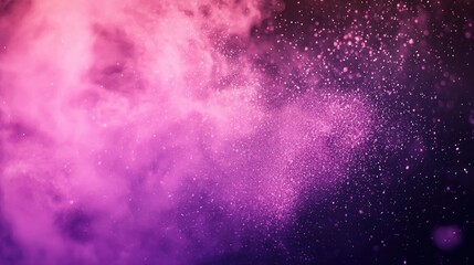 Fototapeta premium A vibrant, abstract explosion of pink and purple particles against a dark background.
