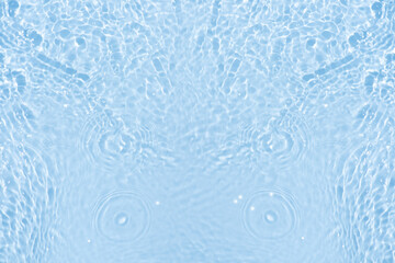 Blue water with ripples on the surface. Defocus blurred transparent blue colored clear calm water...