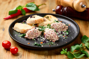 Gourmet Beef Tartare with Truffle Aioli, Microgreens and Toasted Bread