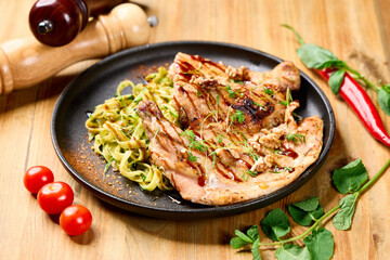 Grilled Chicken Steak with Herb Pasta and Fresh Greens