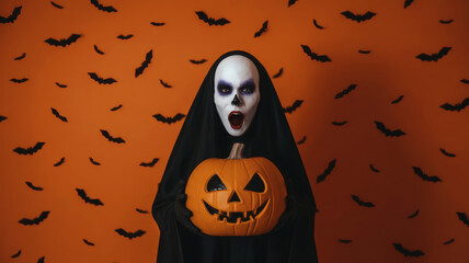 Scary Halloween character with ghostly face paint holding jack-o'-lantern against flying bat background