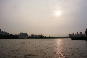Cities and urban parks, rivers, early morning sunrise, skyline