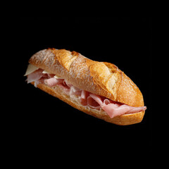 Freshly made sandwich with ham and cheese filling