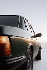Vintage green coupe with clean lines and minimalist background, retro car design in soft light
