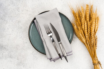 Empty Ceramic Plate on Rustic Stone Table. Minimalist Dining Concept	