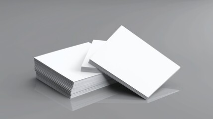 Blank business cards on grey background with space for text and logo design.