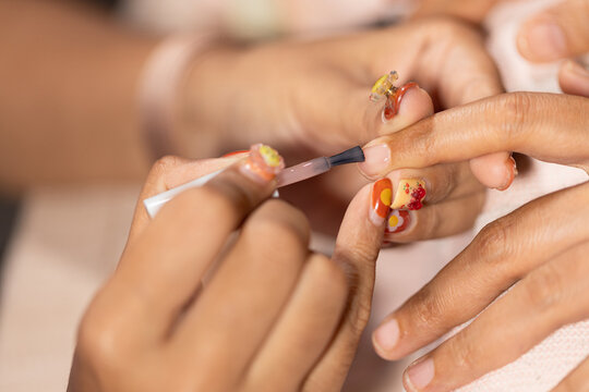 Nail art and beauty treatment at home nail salon with fashion inspired designs creating relaxing and stylish experience for hand care and personal grooming
