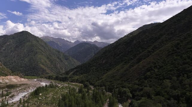 Talgar gorge, Tian Shan Mountains. Different vegetation and a mountain river. The view from the drone.