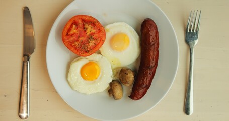 WARSAW, POLAND - MARCH 10 2023: Breakfast with hot and sweet dishes put on table in cafe. Eggs...