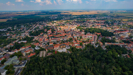 Fototapeta premium A panorama Aerial view around the old town above the city Köthen (Anhalt) on an sunny summer noon in Germany.
