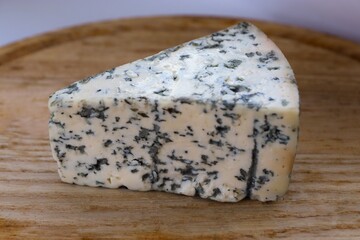 Dorblu Cheese on Wooden Board as the Perfect Component for Gourmet Compositions and Stylish Cheese-Focused Content