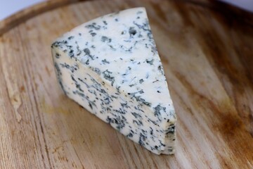 Dorblu Cheese on Wooden Board as the Perfect Component for Gourmet Compositions and Stylish Cheese-Focused Content