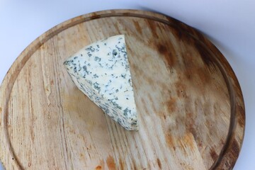 Dorblu Cheese on Wooden Board as the Perfect Component for Gourmet Compositions and Stylish Cheese-Focused Content