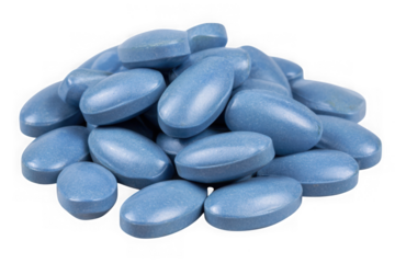 Pile of blue oval shaped pills isolated on transparent background
