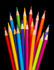 Fototapeta premium Rainbow school pencils on a black background