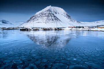 Snowy Mountain and Frozen Harbor