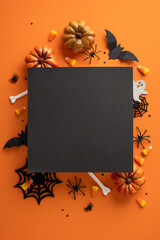 Halloween-themed vertical background with fake pumpkins, bats, candy, and blank black space for text