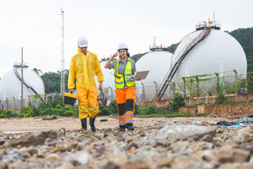 Environmental Workers Team Inspecting Industrial Site, Team in Protective Gear Surveying Contaminated Area, Engineers Assessing Safety at a Chemical Plant