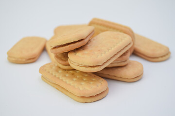 Stacked sandwich cookies against a white background.