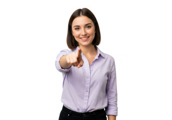 A smiling young woman in a lilac shirt is pointing her finger directly at the viewer isolated on transparent background