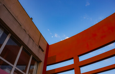 Geometric shapes of modern building facades with blue sky spaces