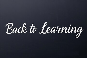 Obraz premium Back to Learning text on black background