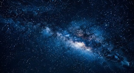 Fototapeta premium A stunning view of the Milky Way galaxy, showcasing its bright core and countless stars against a dark blue cosmic background.