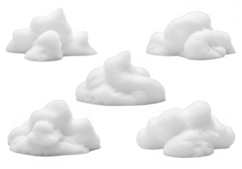 A collection of five piles of white shaving foam or cream isolated on transparent background