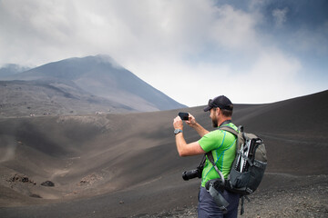 hiker trekking on mount Etna
