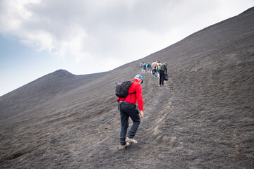 hiker trekking on mount Etna