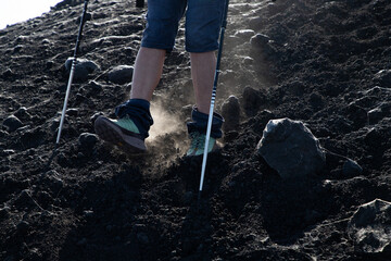 hiker trekking on mount Etna