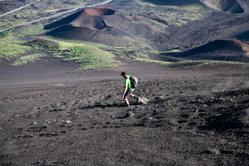 hiker trekking on mount Etna