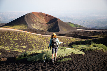 hiker trekking on mount Etna