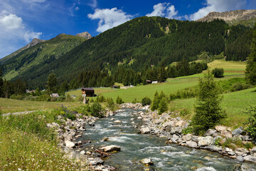 Summer mountain landscape and blue sky with clouds. Location place Alps, Europe.