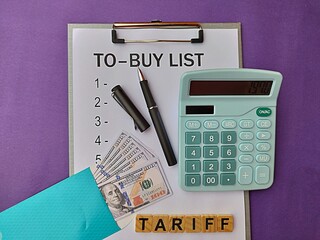 Financial concept display with shopping list, calculator and US Dollar bills in blue envelope with...