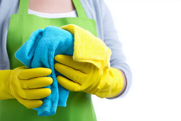 Selective focus detergent bottle, sponge and mop to clean the house isolated on white background, House cleaning equipment on white background, Spray bottle with towel to clean the glass.