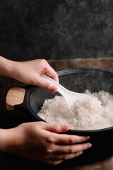 Traditional Asian Comfort Food – Fresh Cooked Rice Ready to Serve, Rice Bowl with Steam and...
