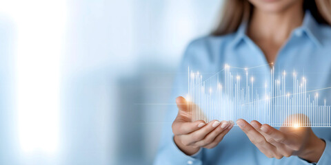Businesswoman holding a holographic graph visualization, representing data analysis, financial growth, and innovation in a modern corporate environment