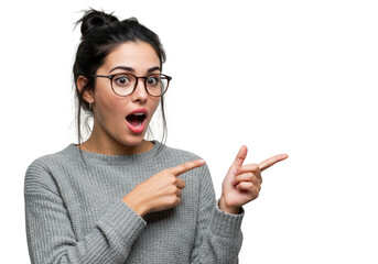 Surprised woman pointing with both index fingers isolated on transparent background