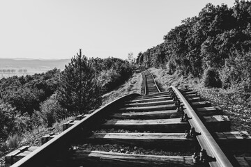 The railway line in Zagrad, Croatia, shows significant damage caused by a landslide. The tracks...