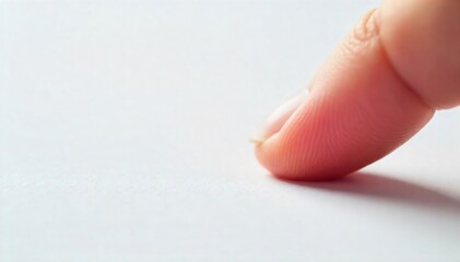 Delicate Fingertip Touching Pristine White Surface Purity, Simplicity, and Gentle Contact