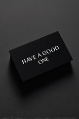 Creative black card with white text have a good one designed for positive messaging studio setting graphic design minimalist view