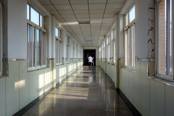 The hospital corridors and windows at sunrise in the early morning