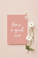 Pastel pink greeting card with casual script design celebratory occasion studio setting minimalist aesthetic