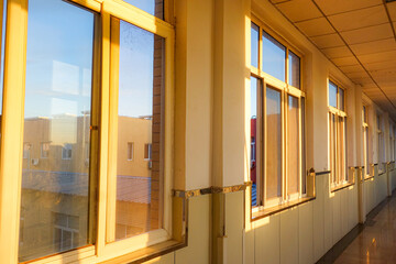 The hospital corridors and windows at sunrise in the early morning