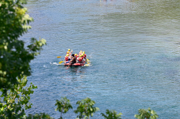 rafting. groups rafting down a flooded river