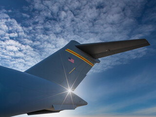 Military airplane tail with sun star
