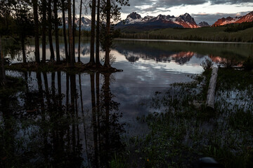 Beautiful mountain lake and reflection sunrise