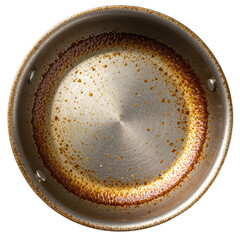 Close-up top-down view of a dirty stainless steel frying pan with burnt food residue, Kitchen cleaning.
