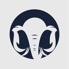 Fototapeta premium Elephant Logo Design: A striking and modern logo showcases the iconic silhouette of an elephant, set against a deep blue circle, reflecting strength and wisdom.